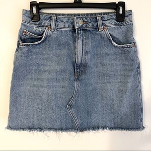 Topshop High waisted Denim Skirt with frayed hem.